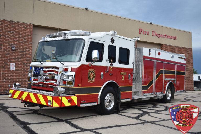 North Sioux City fire engine parked in front of a fire station.